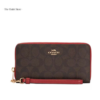 COACH LONG ZIP AROUND WALLET IN SIGNATURE CANVAS(BROWN/ 1941 RED)