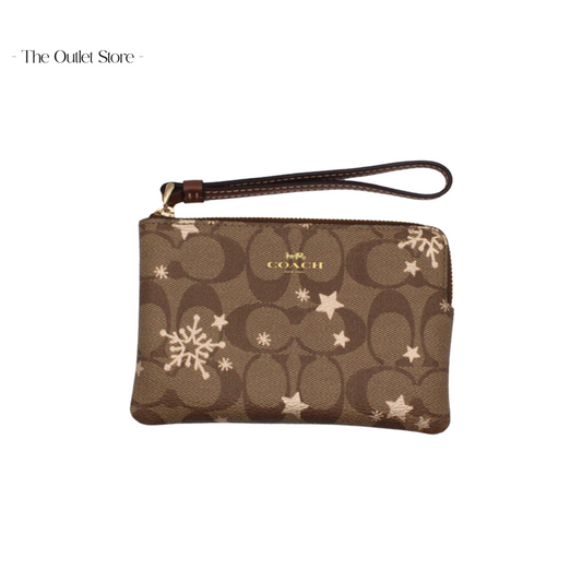 CORNER ZIP WRISTLET IN SIGNATURE CANVAS WITH STAR AND SNOWFLAKES PRINT
