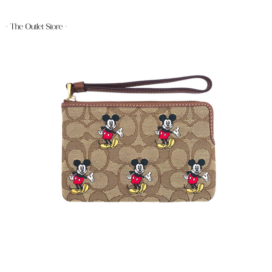 DISNEY X COACH CORNER ZIP WRISTLET IN SIGNATURE JACQUARD WITH MICKEY MOUSE PRINT