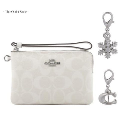 COACH BOXED CORNER ZIP WRISTLET IN SIGNATURE CANVAS