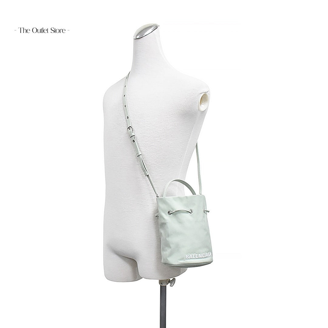 Balenciaga Wheel XS Drawstring Bucket Bag 656682 Light Green – Worn View